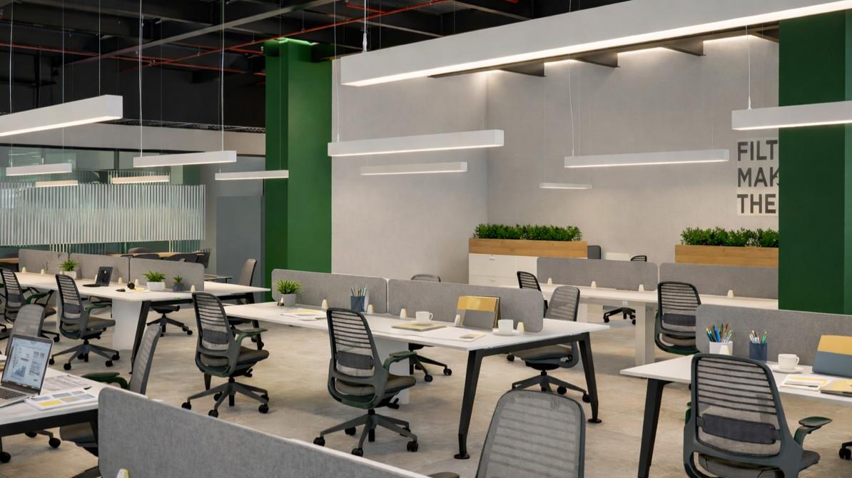 Remodelación de oficinas con iluminación lineal y acentos verdes